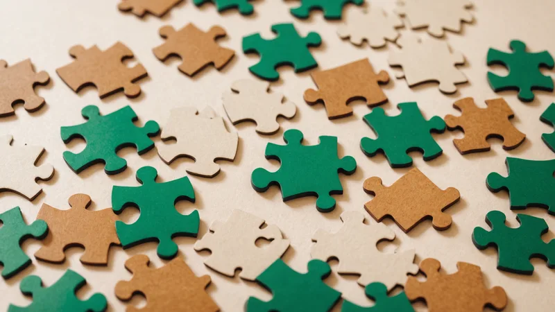 Puzzle pieces scattered representing fragmented market